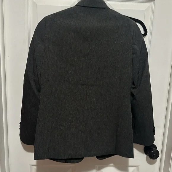 Boys Van Husen 2 pc suit black. Size 14. Brand new with tags.
